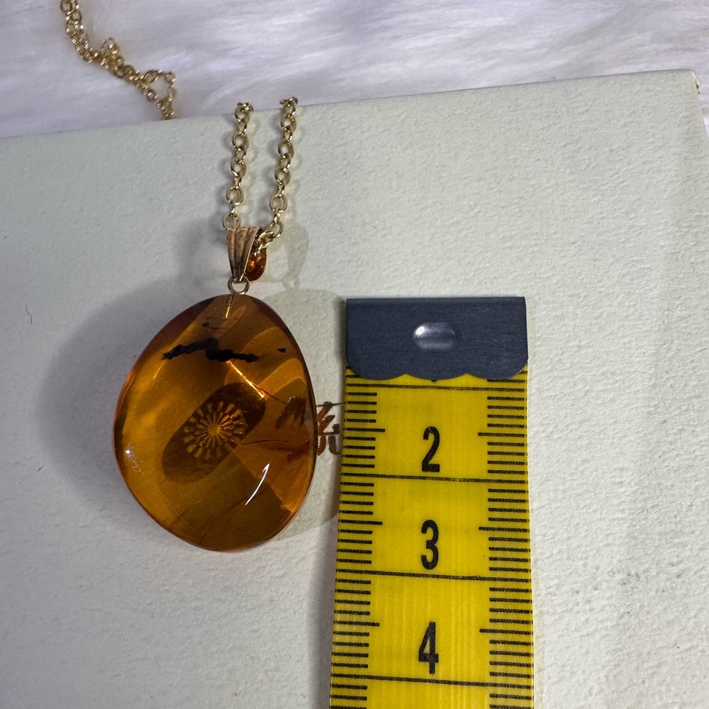 AMBER necklace in 18k gold and plated chain - Picture 16 of 17